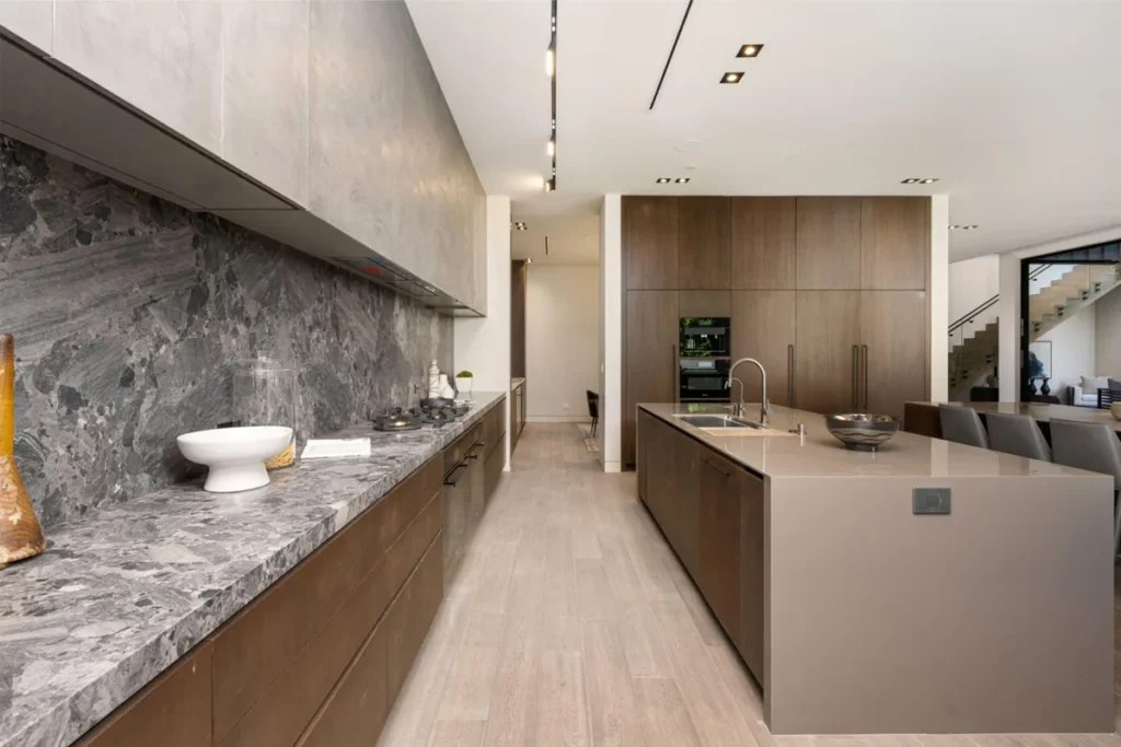 modern kitchen interior design with modular cabinets and marble countertop